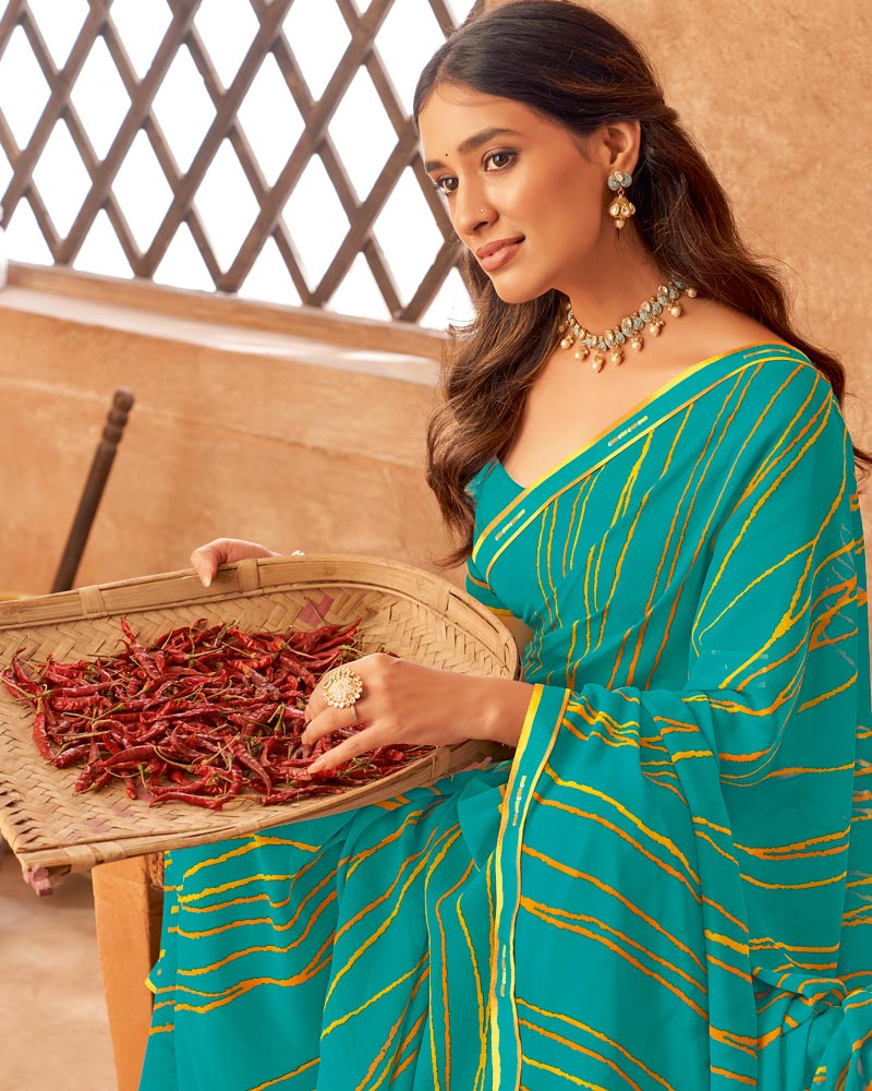 Vishal Prints Teal Blue Printed Georgette Saree With Fancy Border