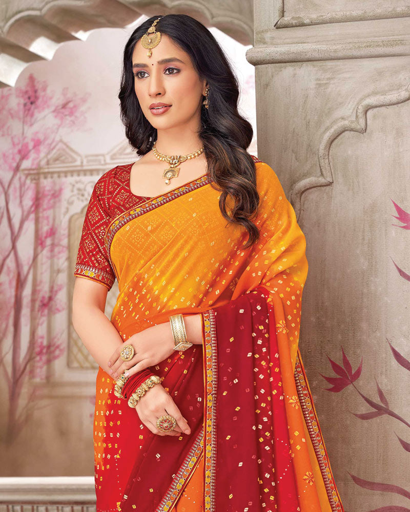 Vishal Prints Deep Saffron Printed Chiffon Bandhani Print Saree With Foil Print And Fancy Border