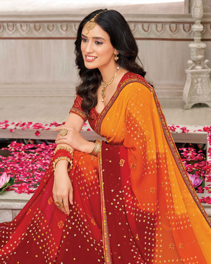 Vishal Prints Deep Saffron Printed Chiffon Bandhani Print Saree With Foil Print And Fancy Border