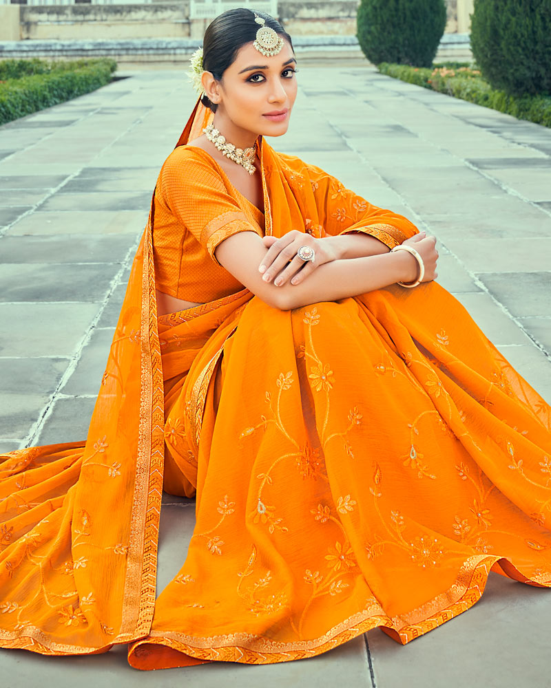 Vishal Prints Orange Georgette Saree With Embroidery Work And Border