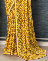 Vishal Prints Light Yellow Printed Brasso Saree With Fancy Border