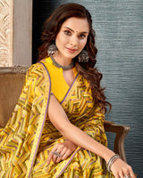 Vishal Prints Light Yellow Printed Brasso Saree With Fancy Border