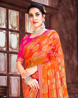Vishal Prints Orange Brasso Saree With Foil Print And Zari Border