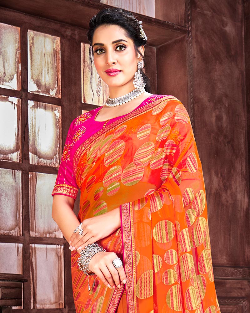 Vishal Prints Orange Brasso Saree With Foil Print And Zari Border