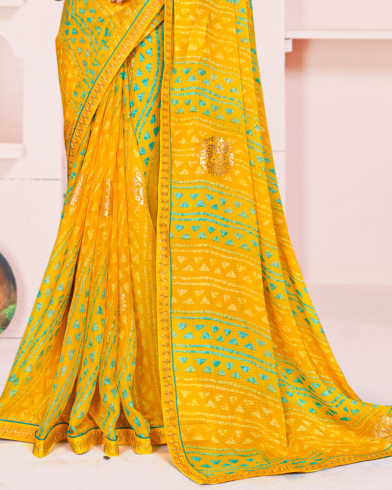 Vishal Prints Yellowish Orange Printed Chiffon Saree With Foil Print And Fancy Embroidery Border