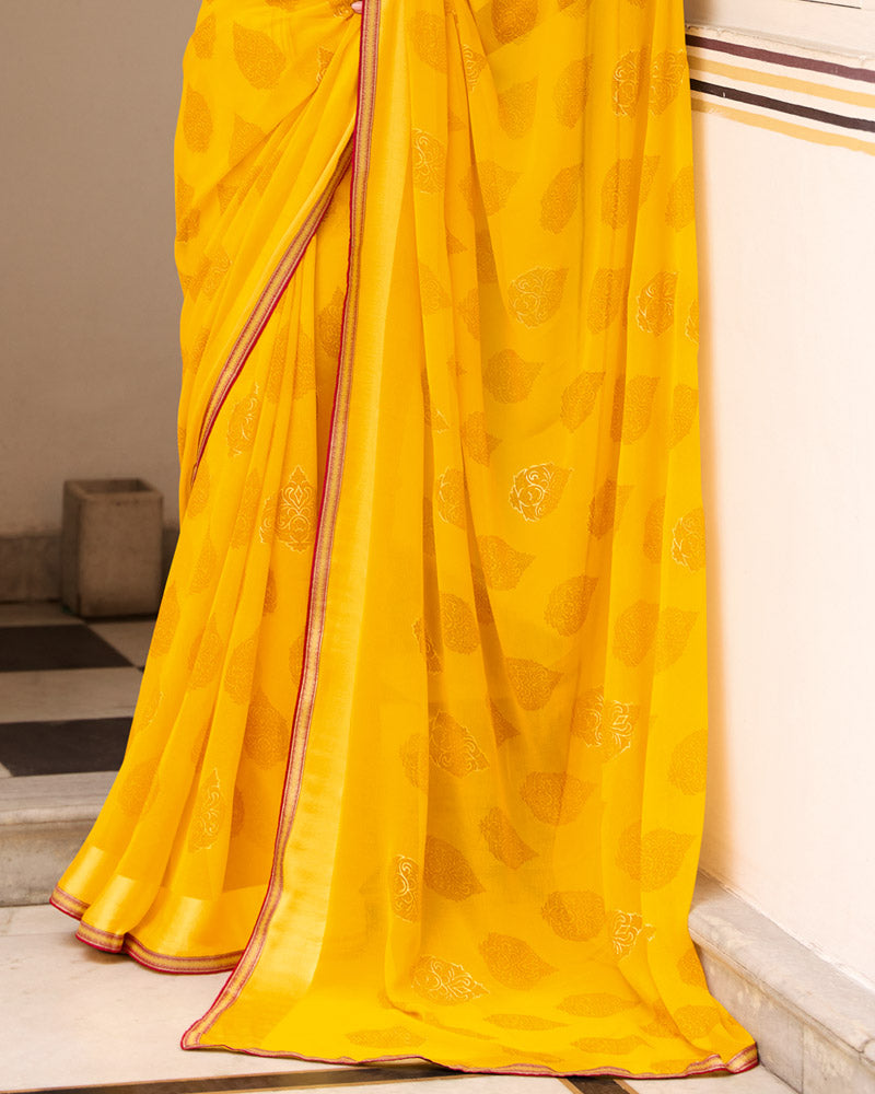 Vishal Prints Golden Yellow Printed Georgette Saree With Foil Print And Satin Patta With Border
