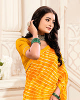 Vishal Prints Yellowish Orange Printed Criva Crepe Lehriya Print Saree With Fancy Border