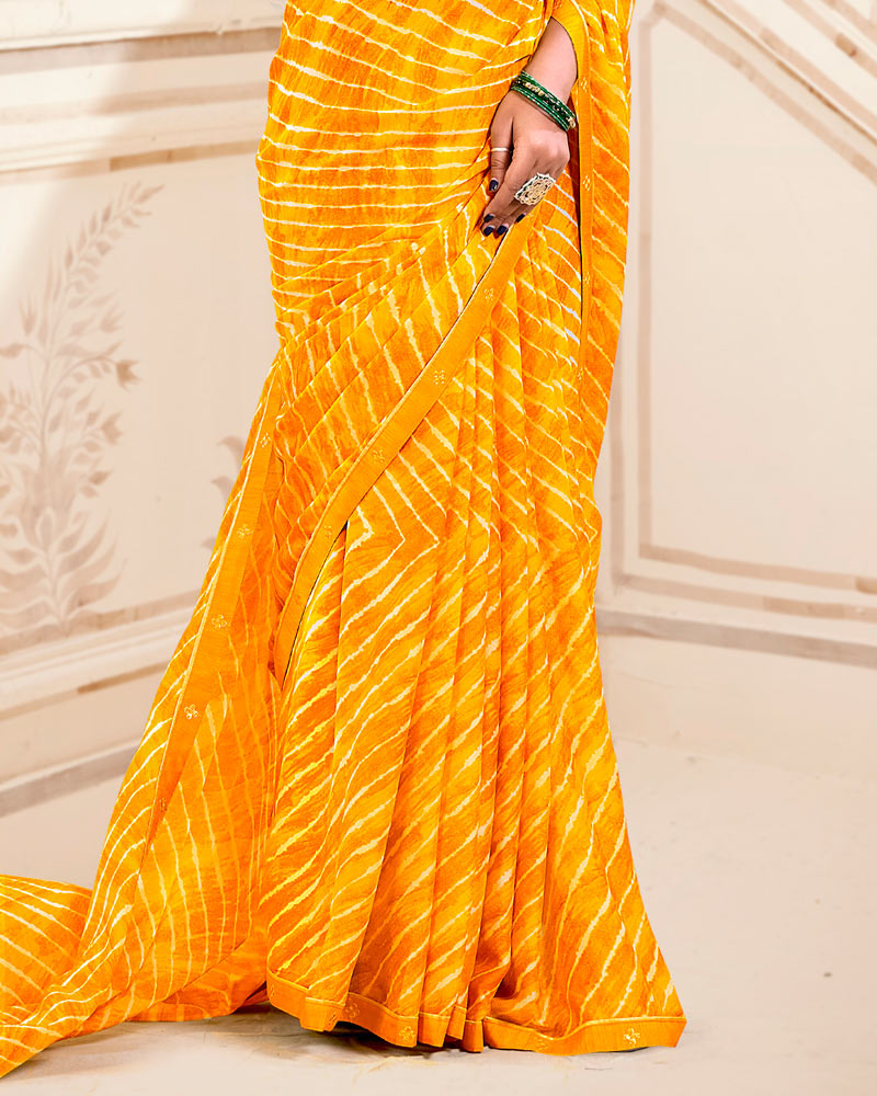 Vishal Prints Yellowish Orange Printed Criva Crepe Lehriya Print Saree With Fancy Border