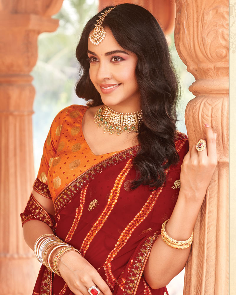 Vishal Prints Brick Red Printed Georgette Traditional Print Saree With Foil Print And Fancy Border