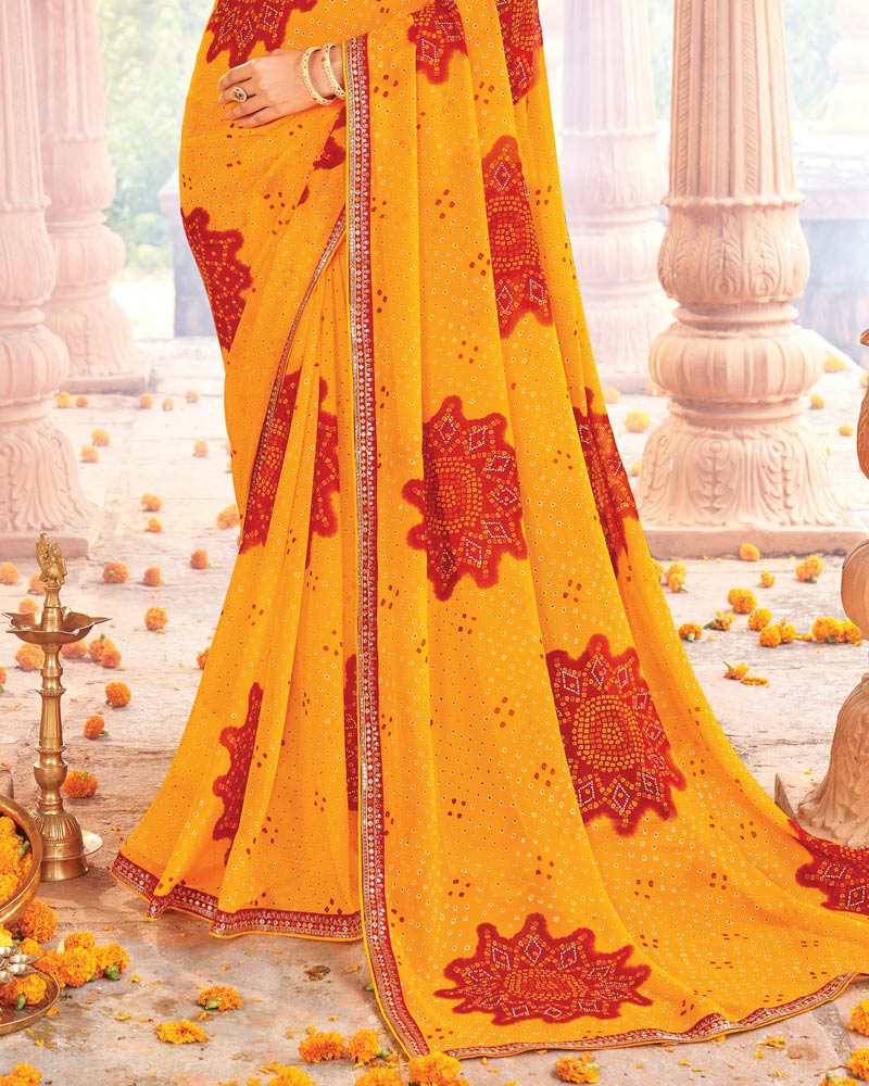 Vishal Prints Orangey Yellow Printed Georgette Traditional Print Saree With Diamond Work And Fancy Border