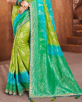 Vishal Prints Mehandi And Dark Green Silk Weaving Saree With Zari Border And Tassel