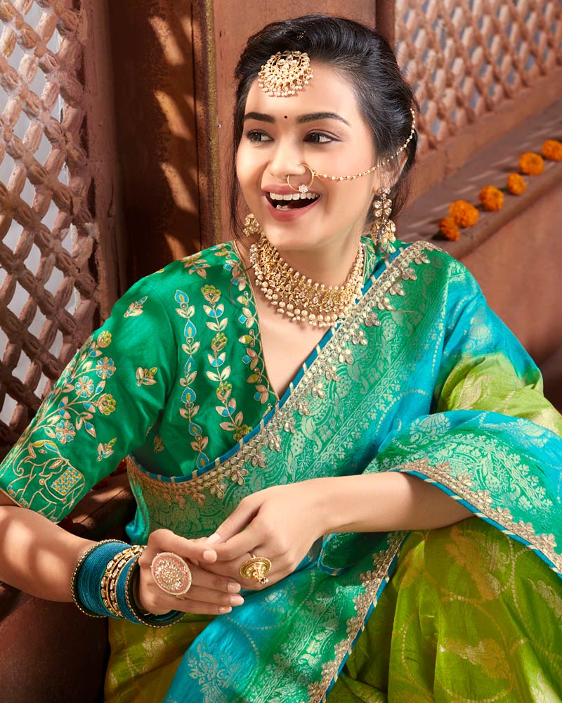 Vishal Prints Mehandi And Dark Green Silk Weaving Saree With Zari Border And Tassel