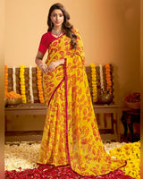 Vishal Prints Squash Yellow Printed Georgette Saree With Satin Piping