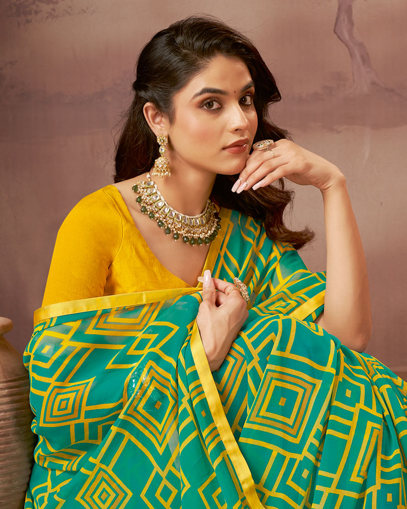 Vishal Prints Teal Green Printed Georgette Saree With Satin Piping
