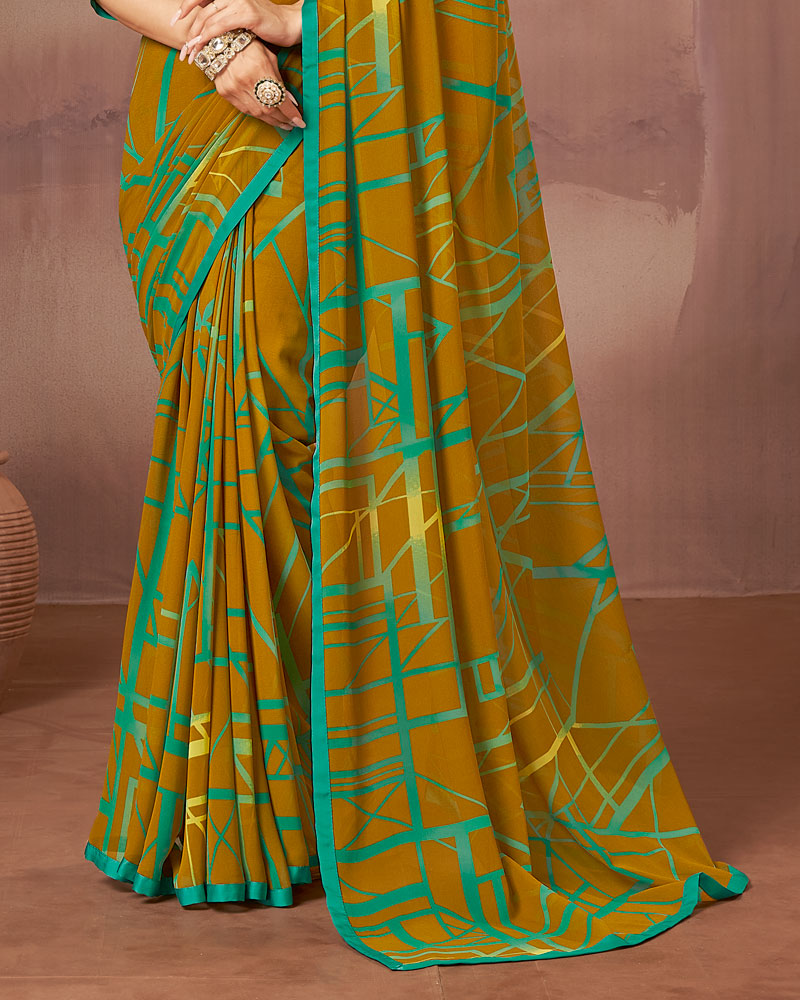 Vishal Prints Dusty Mustard Printed Georgette Saree With Satin Piping