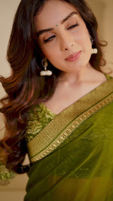 Vishal Prints Mehandi Green Georgette Saree With Foil Print And Jari Border