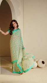 Vishal Prints Rama Green And Cream Georgette Saree With Border