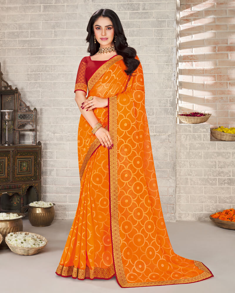Vishal Prints Orange Brasso Saree With Foil Print And Jari Border