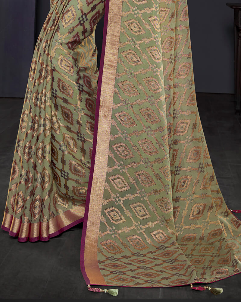 Vishal Prints Sage Green Brasso Saree With Foil Print And Tassel