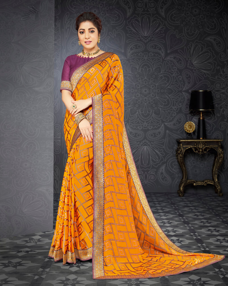 Vishal Prints Saffron Color Brasso Saree With Jari Border And Foil Print