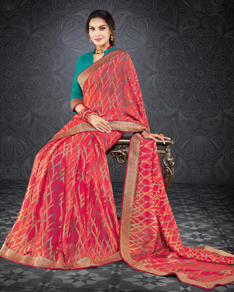 Vishal Prints Pastel Red Brasso Saree With Jari Border And Foil Print