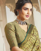 Vishal Prints Light Mehandi Green Brasso Saree With Foil Print And Tassel