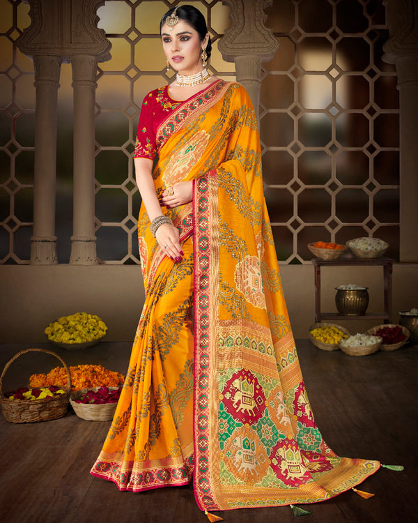 Vishal Prints Golden Yellow Brasso Saree With Weaved Satin Patta And Tassel