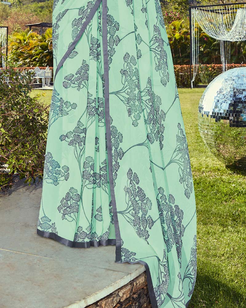 Vishal Prints Turquoise Printed Georgette Saree With Piping