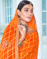 Vishal Prints Dark Orange Designer Brasso Saree With Foil Print And Zari Border