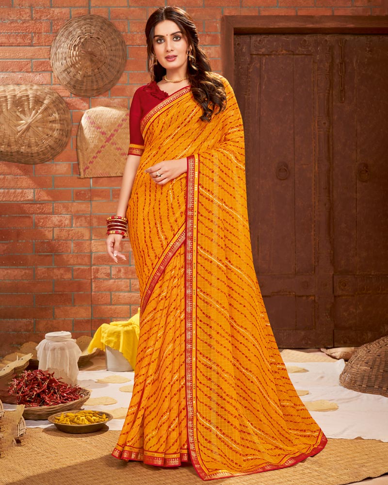 Vishal Prints Orange Printed Chiffon Saree With Border