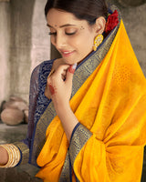 Vishal Prints Dark Yellow Georgette Saree With Foil Print And Zari Border