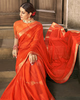 Vishal Prints Dark Orange Georgette Saree With Foil Print And Zari Border