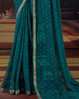 Vishal Prints Peacock Blue Printed Moss Chiffon Saree With Fancy Border