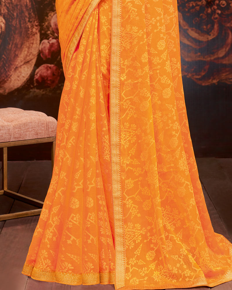 Vishal Prints Yellowish Orange Printed Brasso Saree With Zari Border