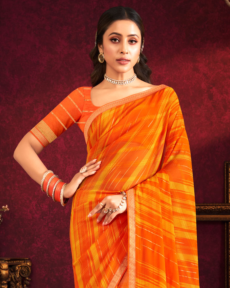 Vishal Prints Dark Orange Fancy Chiffon Saree With Foil Print And Zari Border