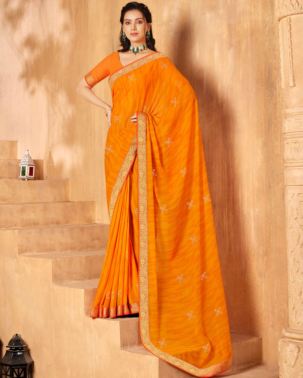 Vishal Prints Orange Georgette Saree With Foil Print And Zari Border