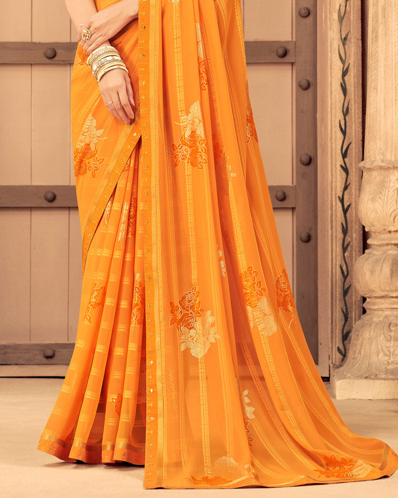 Vishal Prints Saffron Color Patterned Georgette Saree With Foil Print And Border