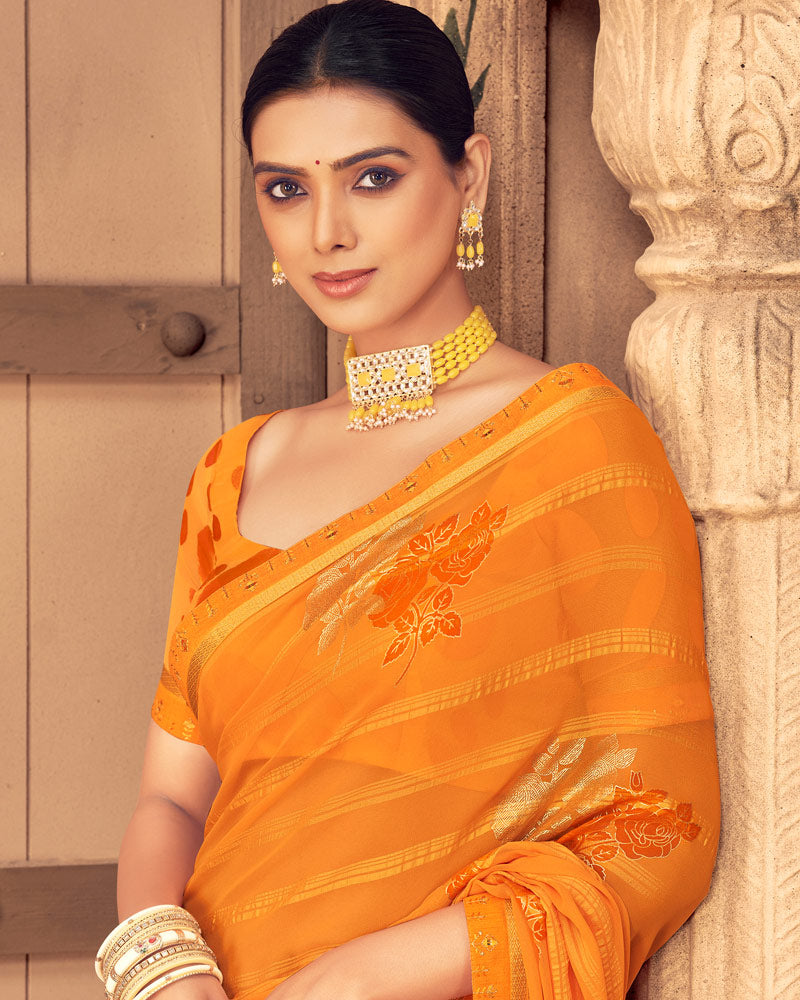 Vishal Prints Saffron Color Patterned Georgette Saree With Foil Print And Border