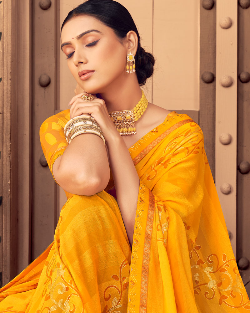 Vishal Prints Dark Yellow Patterned Georgette Saree With Foil Print And Border