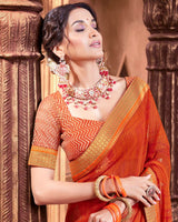 Vishal Prints Dark Orange Chiffon Saree With Foil Print And Zari Border