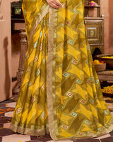 Vishal Prints Mustard Printed Brasso Saree With Foil Print And Fancy Border
