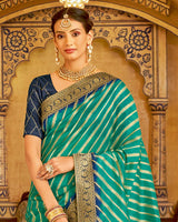 Vishal Prints Dark Turquoise Blue Tissue Weaving Saree With Stone Work And Tassel