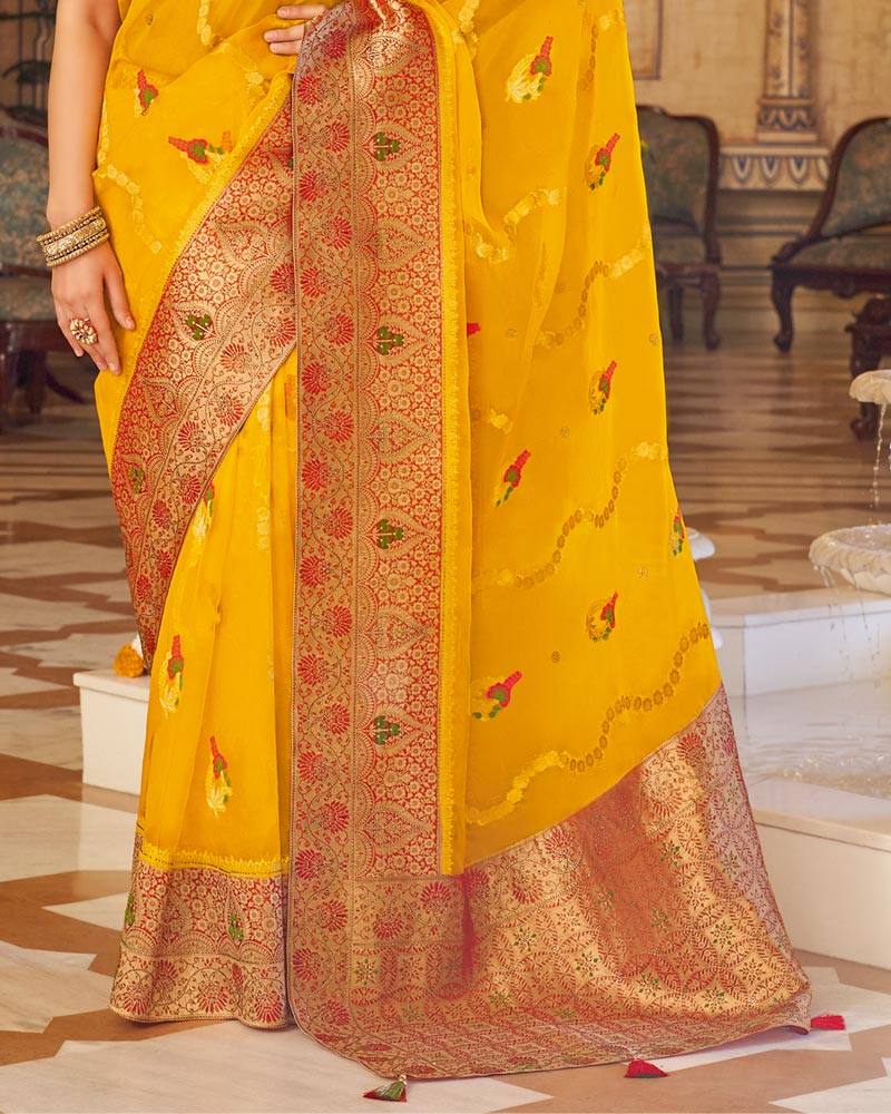 Vishal Prints Dark Yellow Tissue Weaving Saree With Stone Work And Tassel