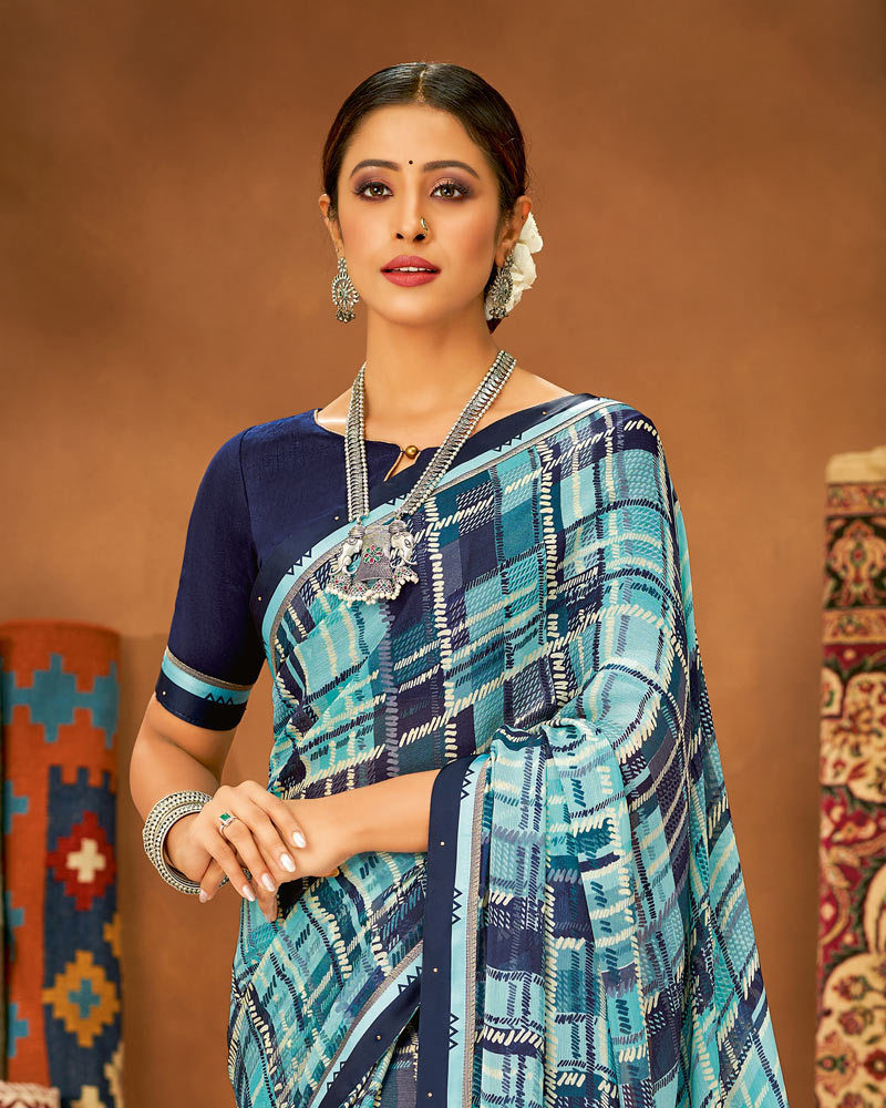 Vishal Prints Light Blue Printed Chiffon Saree With Fancy Lace Border