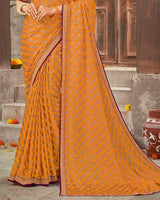 Vishal Prints Dark Orange Brasso Saree With Foil Print And Zari Border
