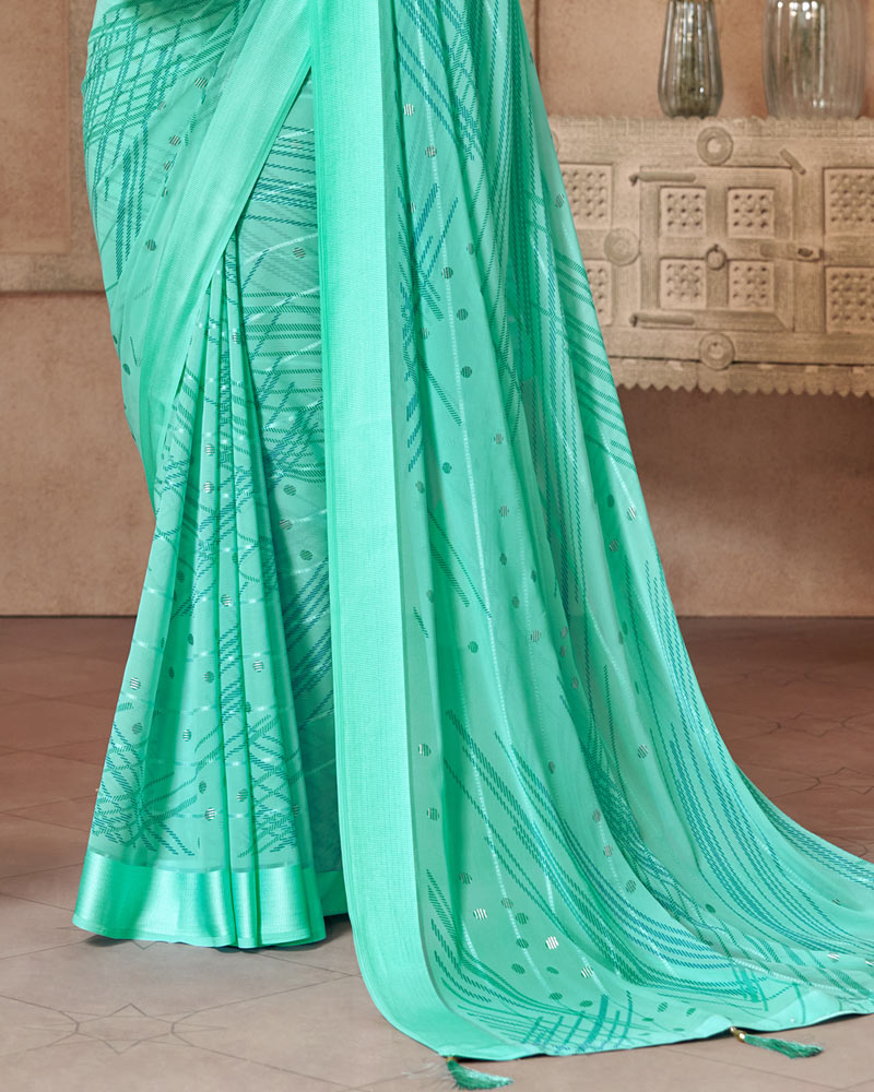 Vishal Prints Aqua Green Printed Fancy Chiffon Saree With Weaved Satin Patta And Tassel