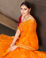 Vishal Prints Orange Brasso Saree With Foil Print And Fancy Border