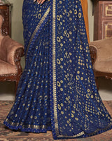 Vishal Prints Dark Blue Patterned Brasso Saree With Fancy Zari Border