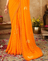 Vishal Prints Saffron Color Printed Georgette Bandhani Print Saree With Foil Print And Fancy Border