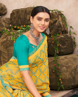 Vishal Prints Dark Yellow Printed Brasso Saree With Fancy Border